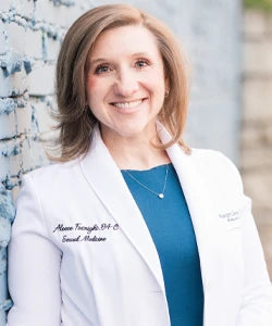 Woman in lab coat Aleece Fosight, NP